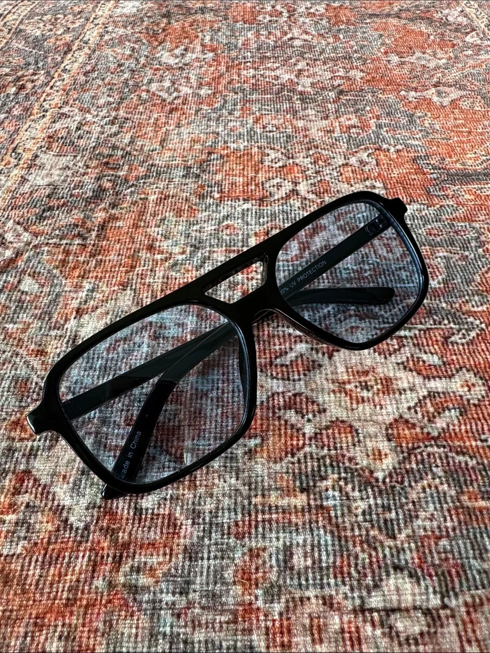 Black Sunglasses with Blue Tinted Lenses